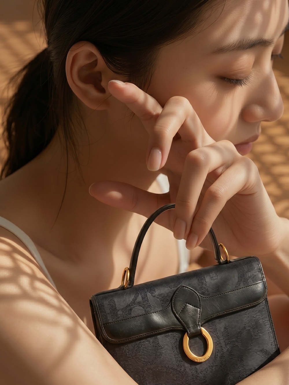 Dior Black Leather Bag with Gold Ring Detail